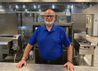 Tom Beckmann standing in a kitchen